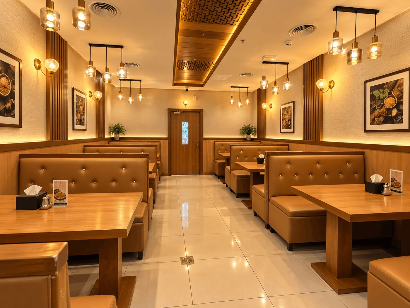 King Chef Restaurant dining room with a timber panelled ceiling and black leather booth seating